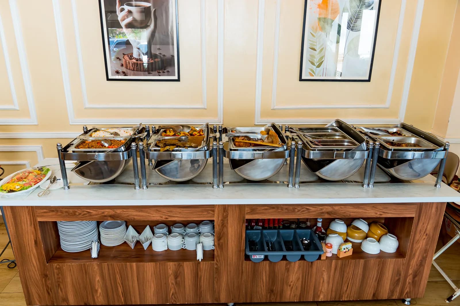 The breakfast buffet counter at HMK Living, Kigo Kampala