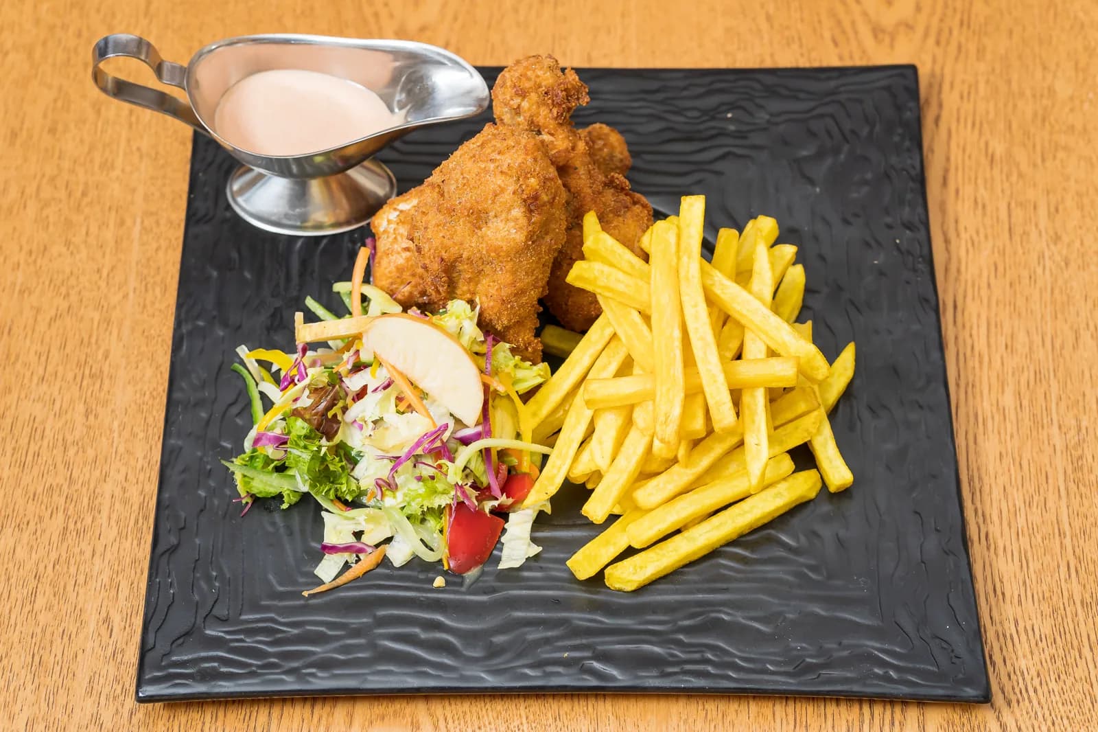 Crispy chicken and fries at HMK Living, Kigo Kampala