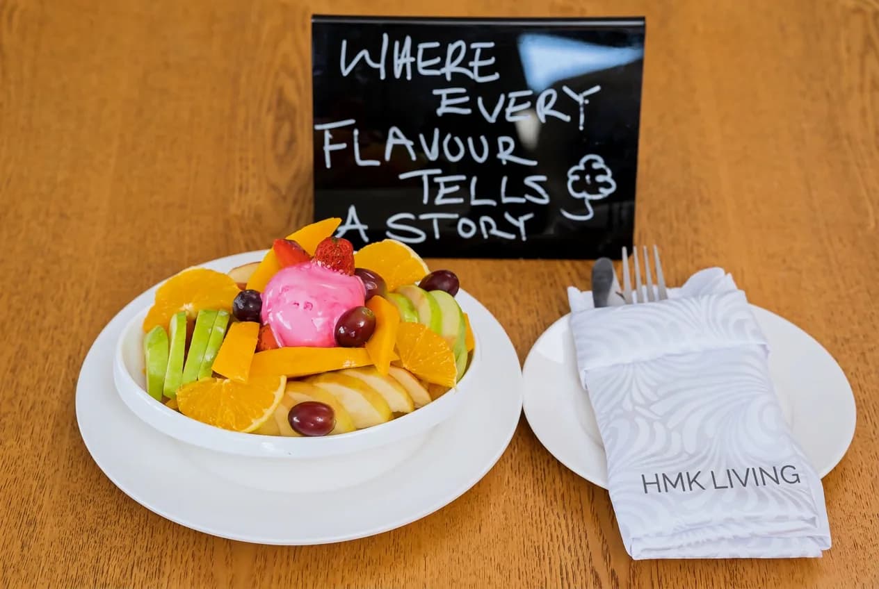A bowl of fresh fruit from the ground-floor restaurant at HMK Living, Kigo Kampala
