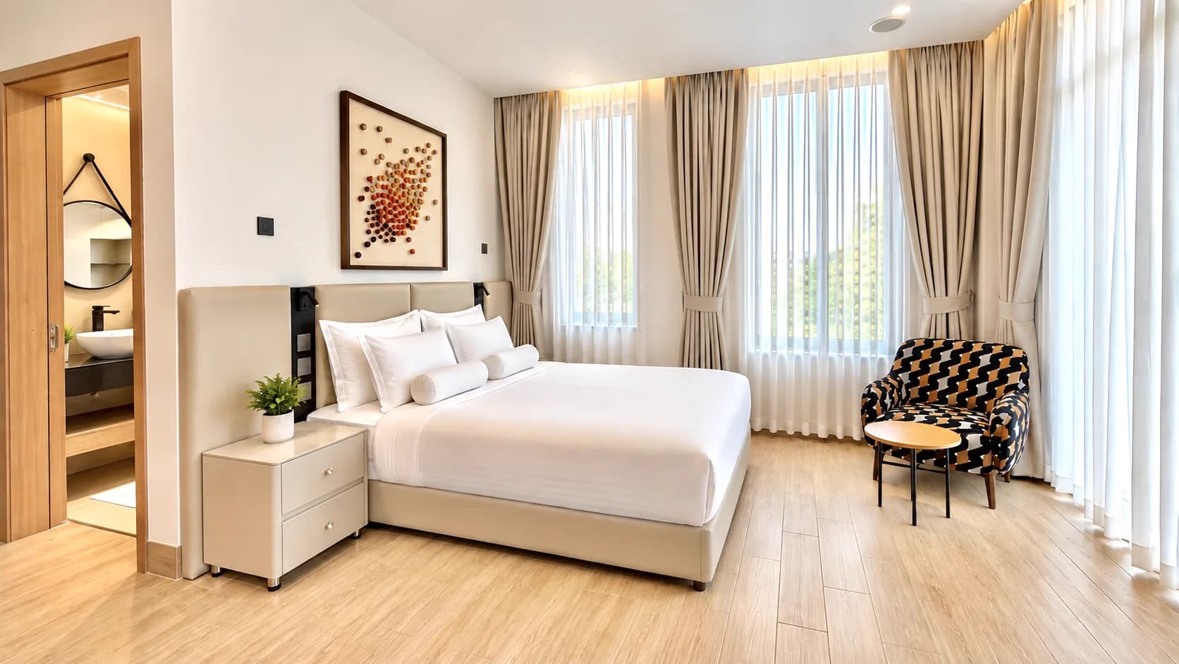 Studio Deluxe with bed, writing desk and full-height window, Kigo Kampala